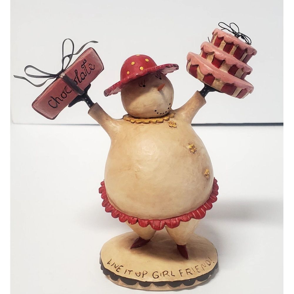 Charming Holiday Figurine with Red Accents